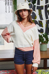 cream V-neck tery top