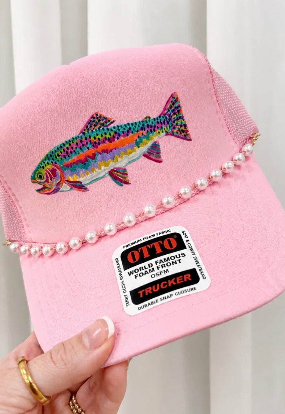 Neon fish trucker hat