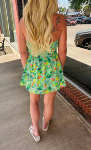 Green multi strapless romper