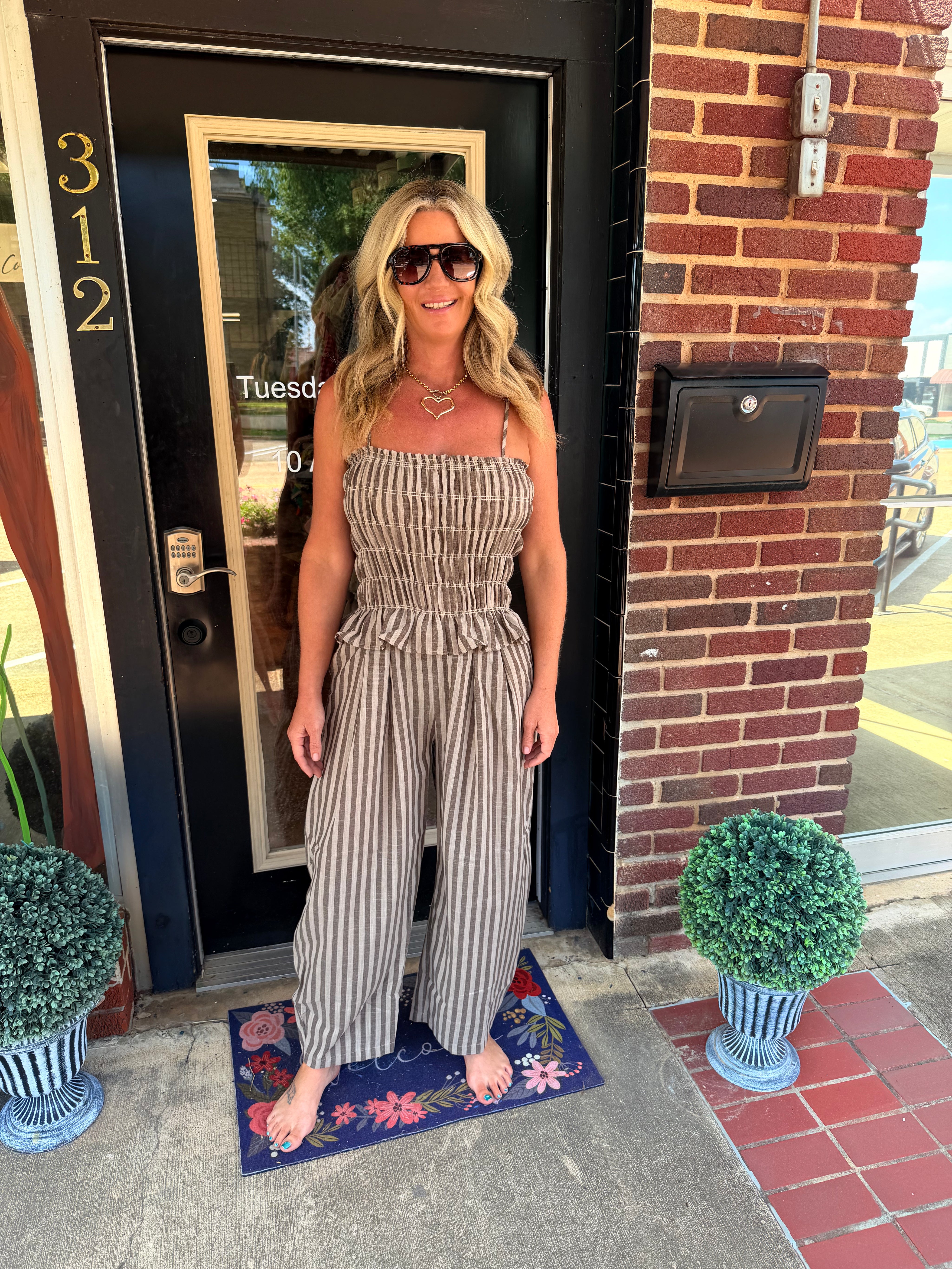 Sandy Shores Smocked Stripe Jumpsuit