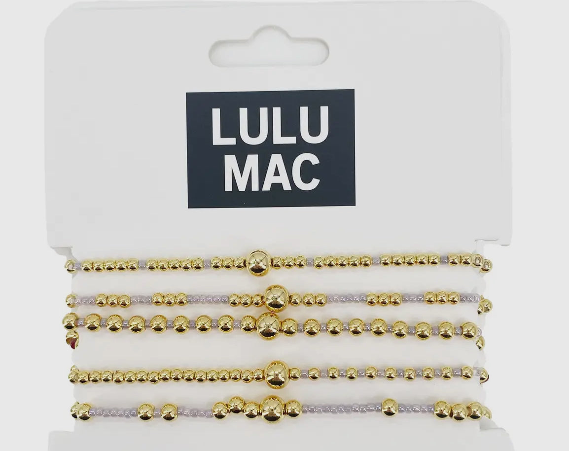 Lulu Mac colorful bracelet stack