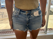 Mid rise risen slit shorts